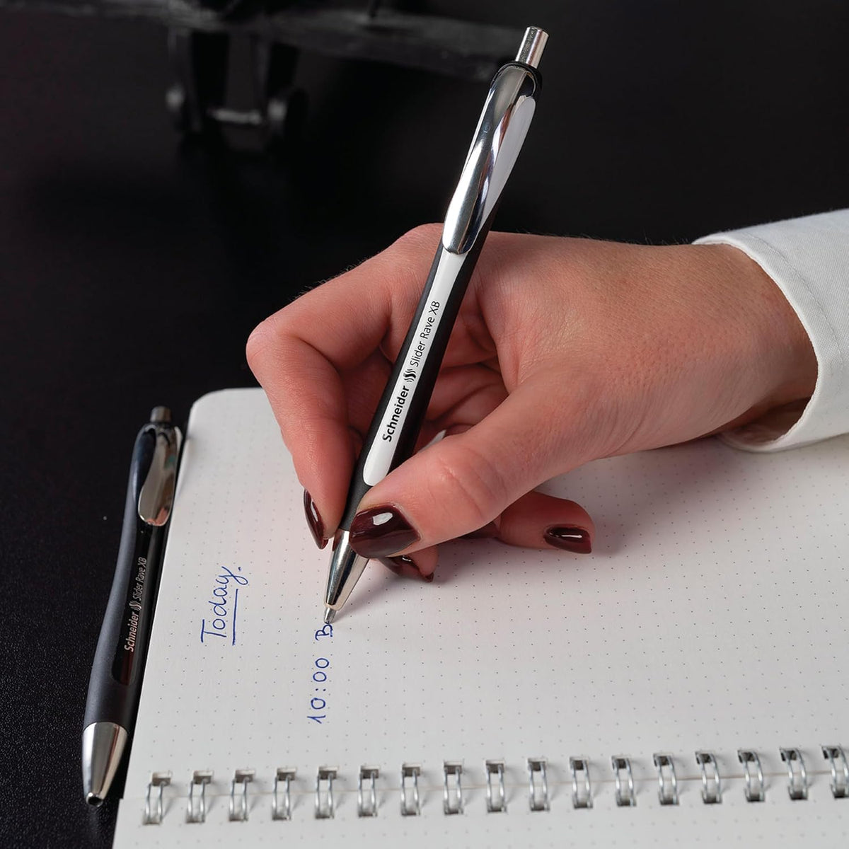 Schneider Limited Edition Slider Rave Black, XB (Extra Broad) Ballpoint Pen, Refillable + Retractable, 1.4 mm, White-Black Barrel, Blue Ink, Box of 5 Pens (132549)